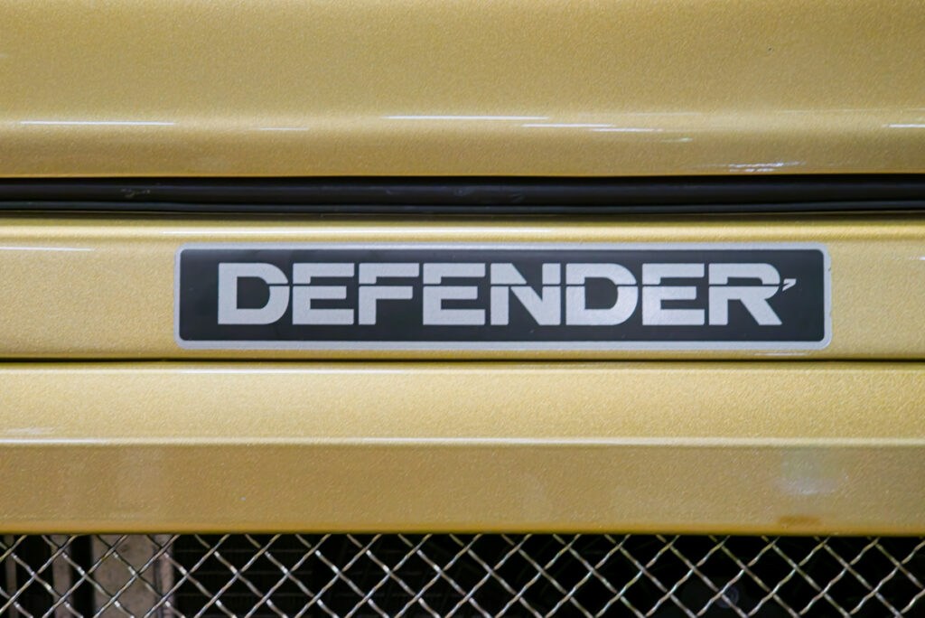 Land Rover Defender nameplate.